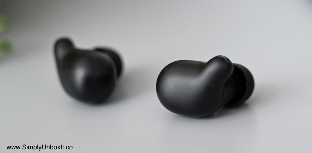 Haylou T15 earbuds closeup